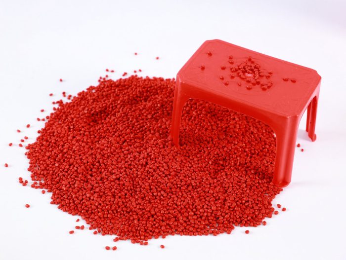 Red plastic product colored with Mega Plast's masterbatch, showcasing the wide range of achievable shades